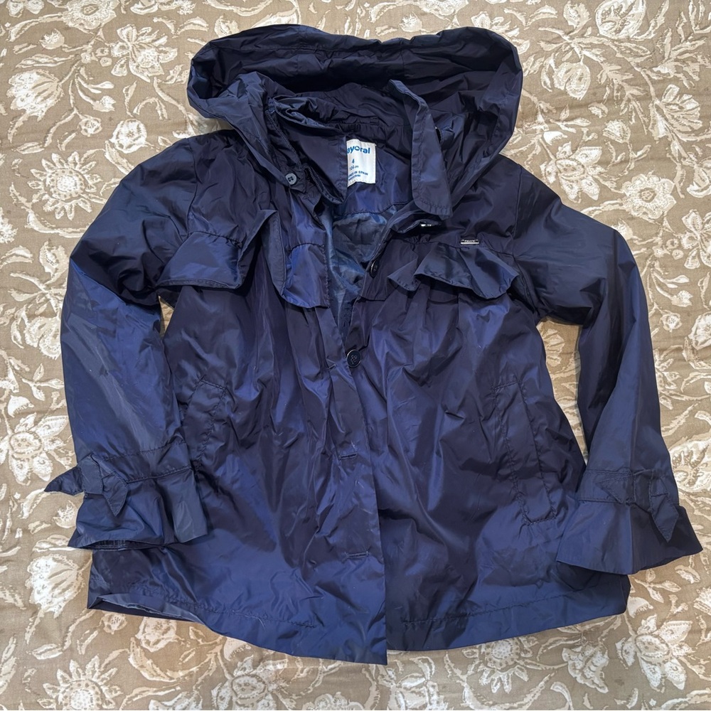 Mayoral girls navy blue rain jacket, size 4.